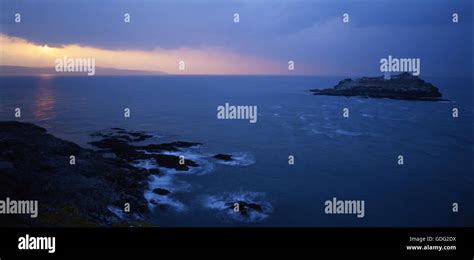 Godrevy Lighthouse at sunset Stock Photo - Alamy