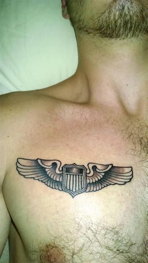 A simple one: Pilot Wings, courtesy of Roger at Bomber Crew Tattoo, Carbondale IL : tattoos