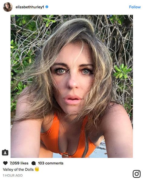 Elizabeth Hurley Looks Red Hot As She Flashes Cleavage In Tiny Bikini