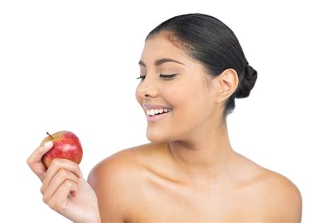 Premium Photo Happy Nude Brunette Holding Red Apple