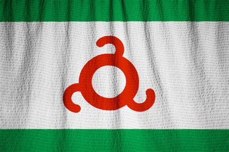 Premium Photo | Closeup of ruffled ingushetia flag, ingushetia flag ...