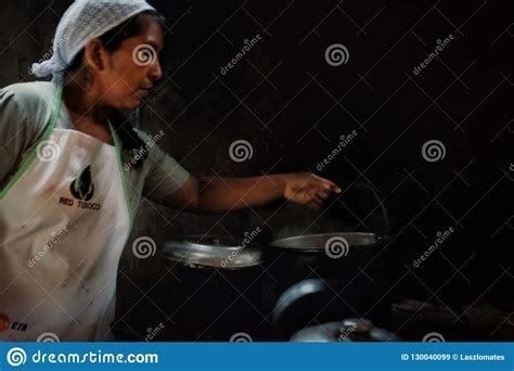 Local Tribal Lady Boiling Water At Her Rainforest Home Editorial Stock