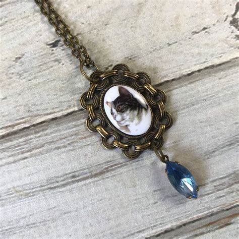 Chubby Small Brown Tabby Cat Cameo Pendant Necklace With Blue Glass