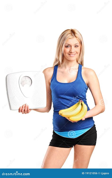 Athlete Holding A Weight Scale And Bananas Stock Photo Image Of