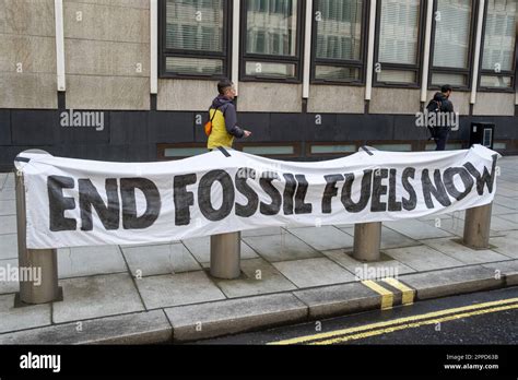 End Fossil Fuels Now Protest Banner Beside Road In London During