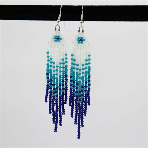 Cheryl Haas Shades Of Blue Fringe Earrings With Flower Rrmm