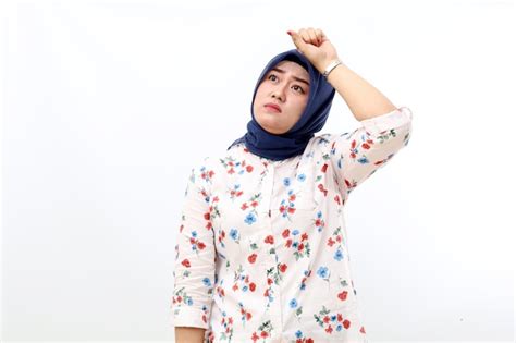 Premium Photo Tired Asian Muslim Woman Standing While Holding Her