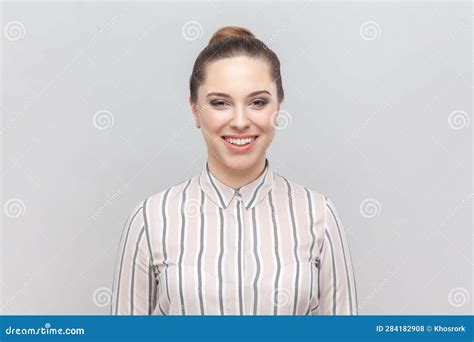 Attractive Woman Looking At Camera With Toothy Smile Being In Good