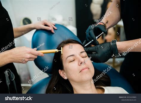 Woman Getting Botulinum Toxin Fillers On Stock Photo