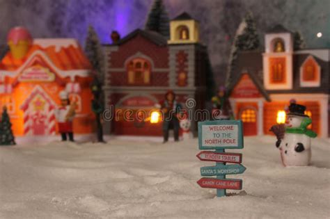 Winter Christmas Village with Snow and Lights Stock Photo - Image of ...