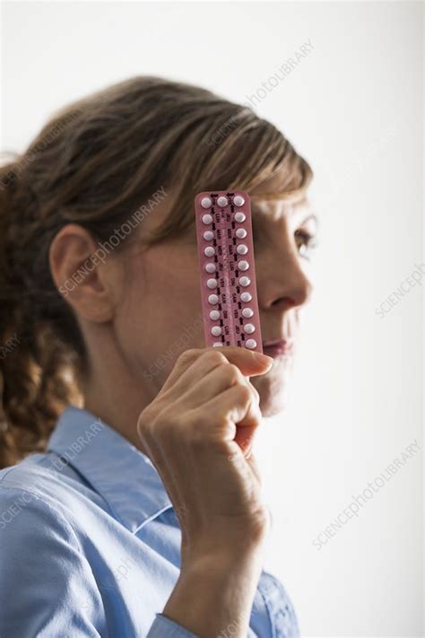 Menopausal woman with hormone replacement therapy pills - Stock Image - F025/5191 - Science ...