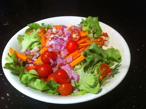 Salad Fresh Coral Lettuce Cherry Tomato Sliced Carrot And Diced Red