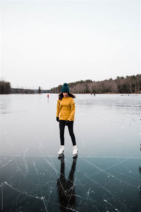 "Stock Photo Of Teenage Girl Skating On A Frozen Lake" by Stocksy Contributor "Lea Jones" - Stocksy