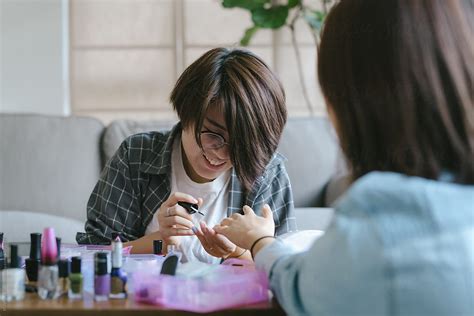 Girls Doing Their Nails At Home By Stocksy Contributor MaaHoo Stocksy