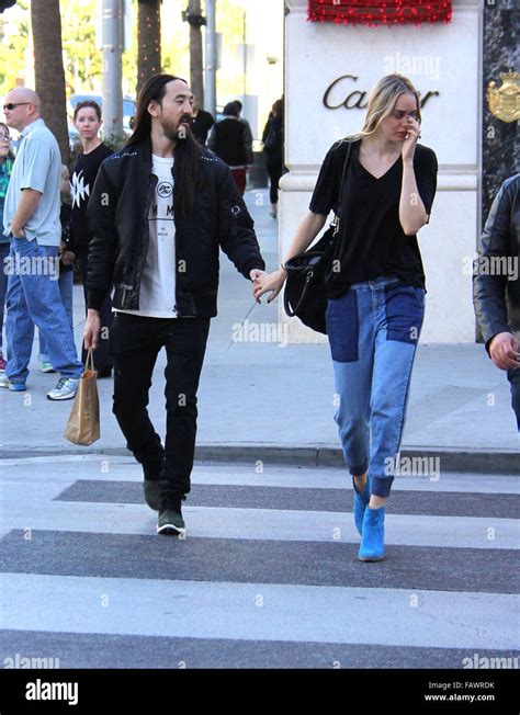 Musician Steve Aoki Hold Hands With His Fiancee Tiernan Cowling As They