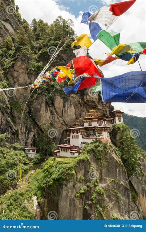 Taktsang Palphug Monastery With Prayer Flag Also Known As The Tiger