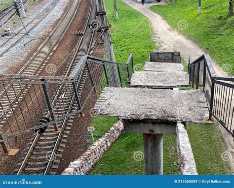 Old Collapsed Steps Of A High Railway Bridge With Holes Broken