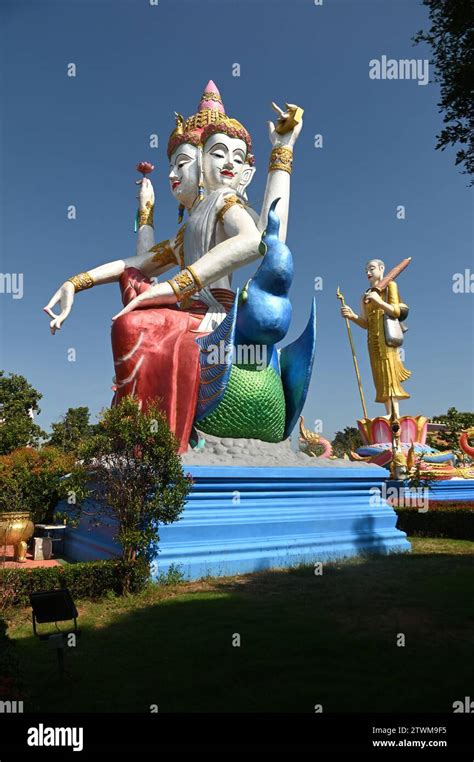 A Large Outdoor Four Faced And Four Hands Brahma Statue Represents The