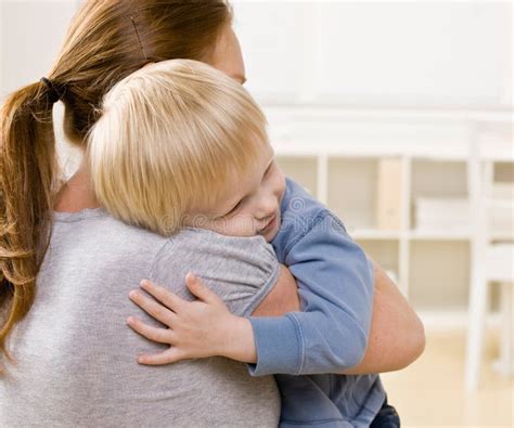 Mother Hugging And Comforting Her Son Stock Photo Image Of Comforting