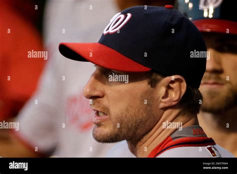 Washington Nationals Starting Pitcher Max Scherzer Stands In The Dugout