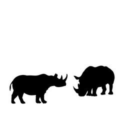 Silhouette rhino and young small rhino Royalty Free Vector