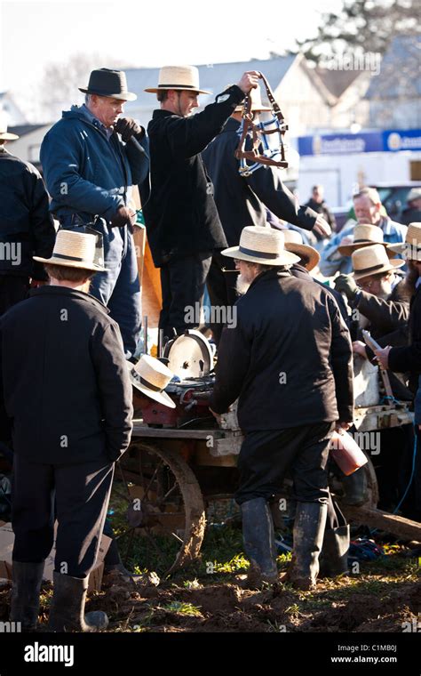 Amish Auctioneers During The Annual Mud Sale To Support The Fire