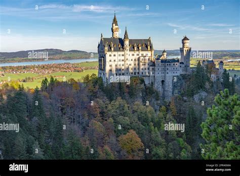 view of Neuschwanstein Castle and Forggensee from the ridge path above ...