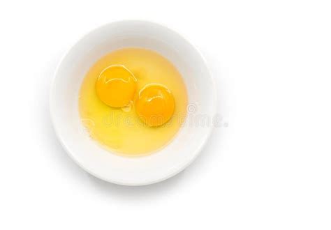 Isolated Raw Chicken Eggs Top View Of Two Raw Egg Yolk In White Bowl