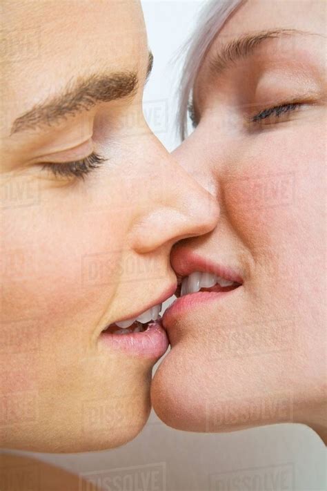 A Lesbian Couple Kissing Stock Photo Dissolve