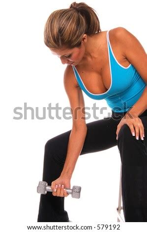 Sexy Latina Fitness Instructor Working Out With Free Weights Stock