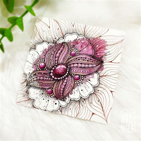 An Intricately Designed Card On A White Furnishing