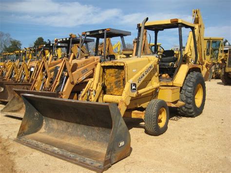 JOHN DEERE 410B LOADER BACKHOE - J.M. Wood Auction Company, Inc.