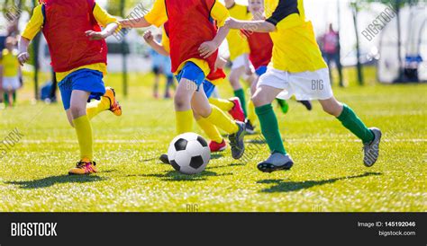 Kids Kicking Soccer Image & Photo (Free Trial) | Bigstock