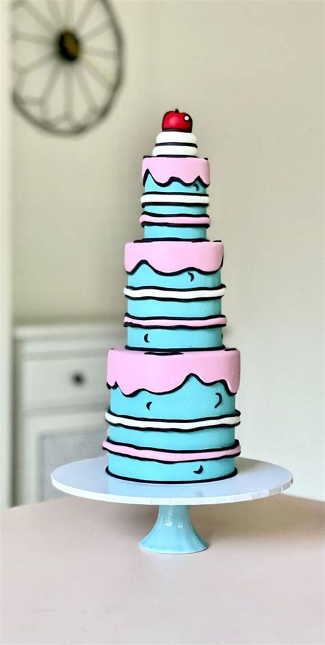 Cute Comic Cakes For Cartoon Lovers Three Tiered Blue And Pink Cake