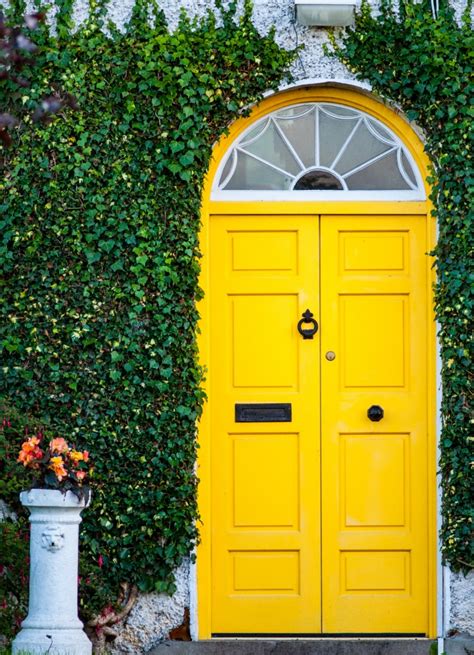 Embrace Sunshine Vibes With A Vibrant Yellow Front Door