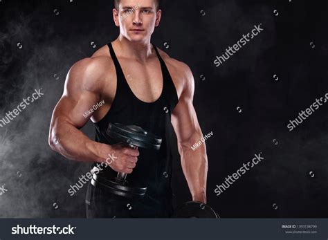 Muscular Fitness Sports Man Atlete Dumbbell Stock Photo