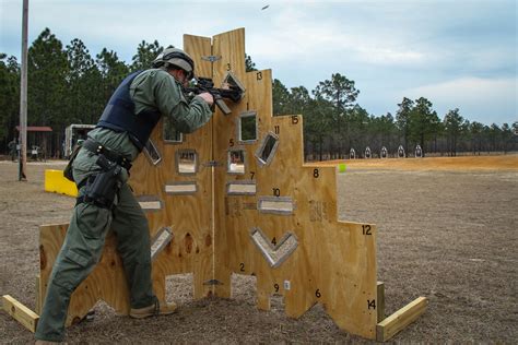 Photo Special Reaction Team Soldier Firing Through Barricades