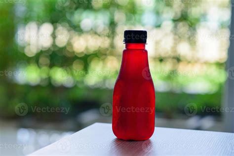 Roselle Juice In A Plastic Bottle With Nature Green Background 8119323