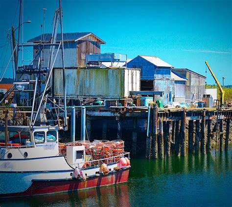 Premium Photo Trawler Moored At Port Against Clear Sky