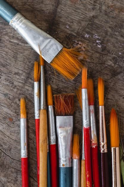 Premium Photo Vertical Overhead Shot Of Different Paintbrushes