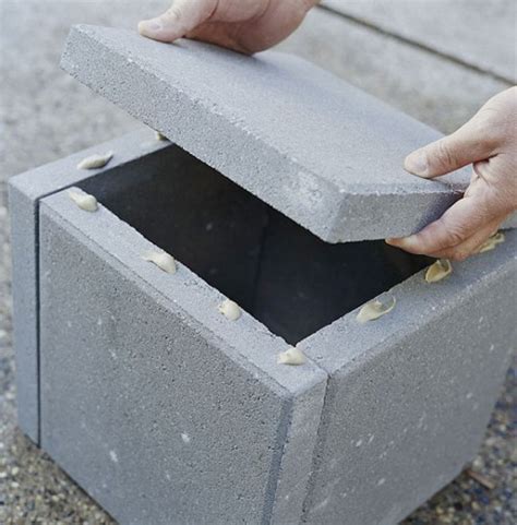 Simple DIY Concrete Outdoor Planters From Pavers - Shelterness