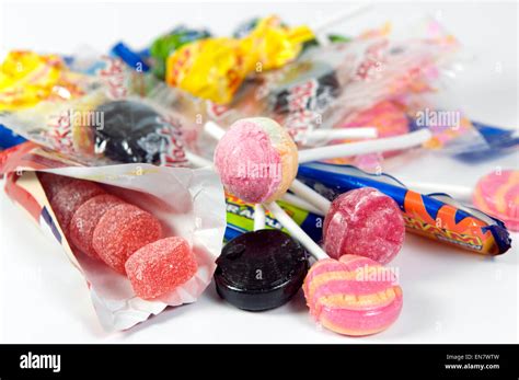 Random selection of kids sweets on white background Stock Photo - Alamy