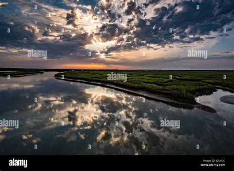 Sunrise Over The Tidal Salt Marshes Of The Cape Romain National Wildlife Refuge At Sunrise Near