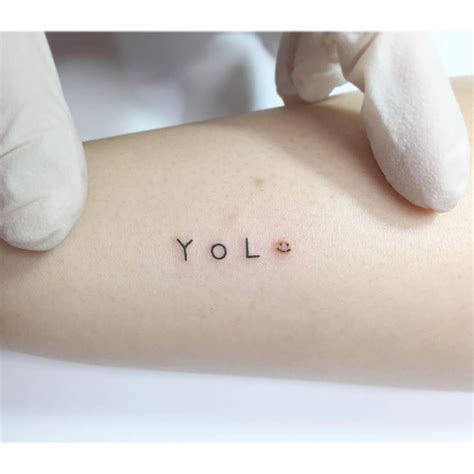 Yolo Tattoo On Wrist