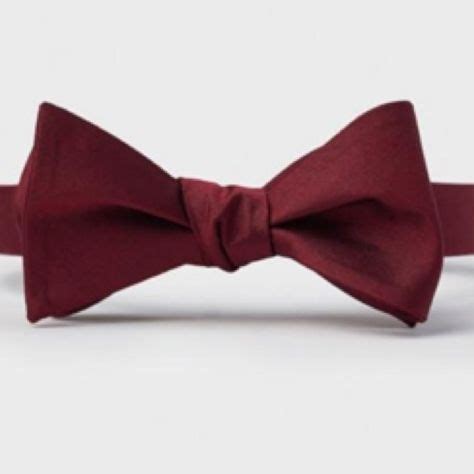 A Close Up Of A Bow Tie On A White Background