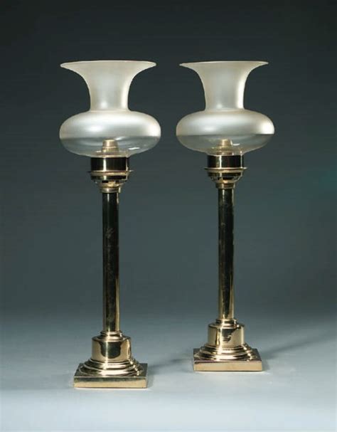 A Pair Of Victorian Palmers And Co Brass Patent Spring Pusher Candlesticks Late 19th Century