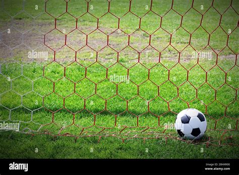 soccer ball in goal Stock Photo - Alamy