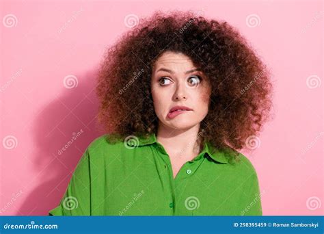 Photo Of Unsure Uncertain Young Lady Wear Green Shirt Biting Lip