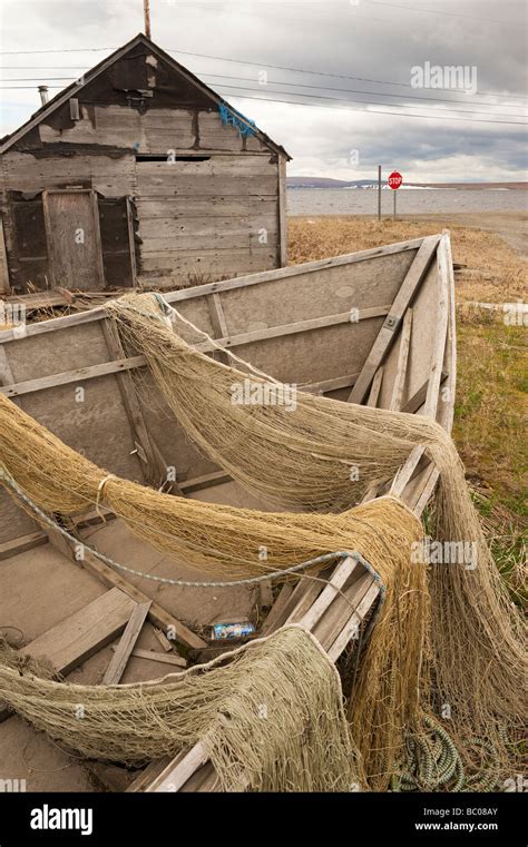 Fishing Nets Hang Over The Side Of An Old Wood Fishing Boat Teller