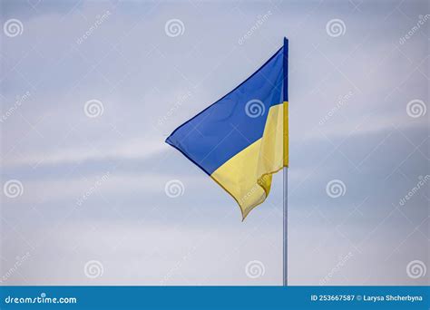 Blue Yellow Ukrainian Flag Against A Cloudy Sky Stock Image Image Of